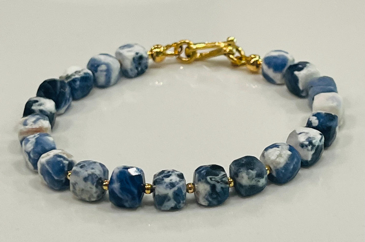 Sodalite Beaded Bracelet with Gold Decorative Clasp 7mm Faceted Cubed Sparkling Sodalite Beaded Bracelet Blue and White Beaded Bracelet