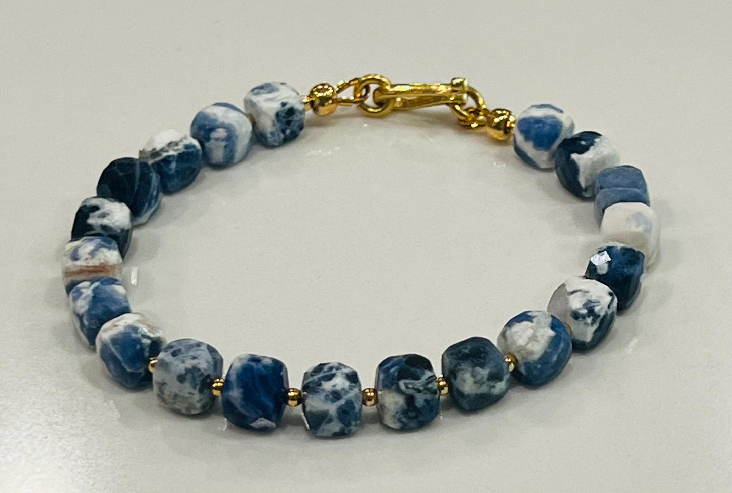 Sodalite Beaded Bracelet with Gold Decorative Clasp 7mm Faceted Cubed Sparkling Sodalite Beaded Bracelet Blue and White Beaded Bracelet